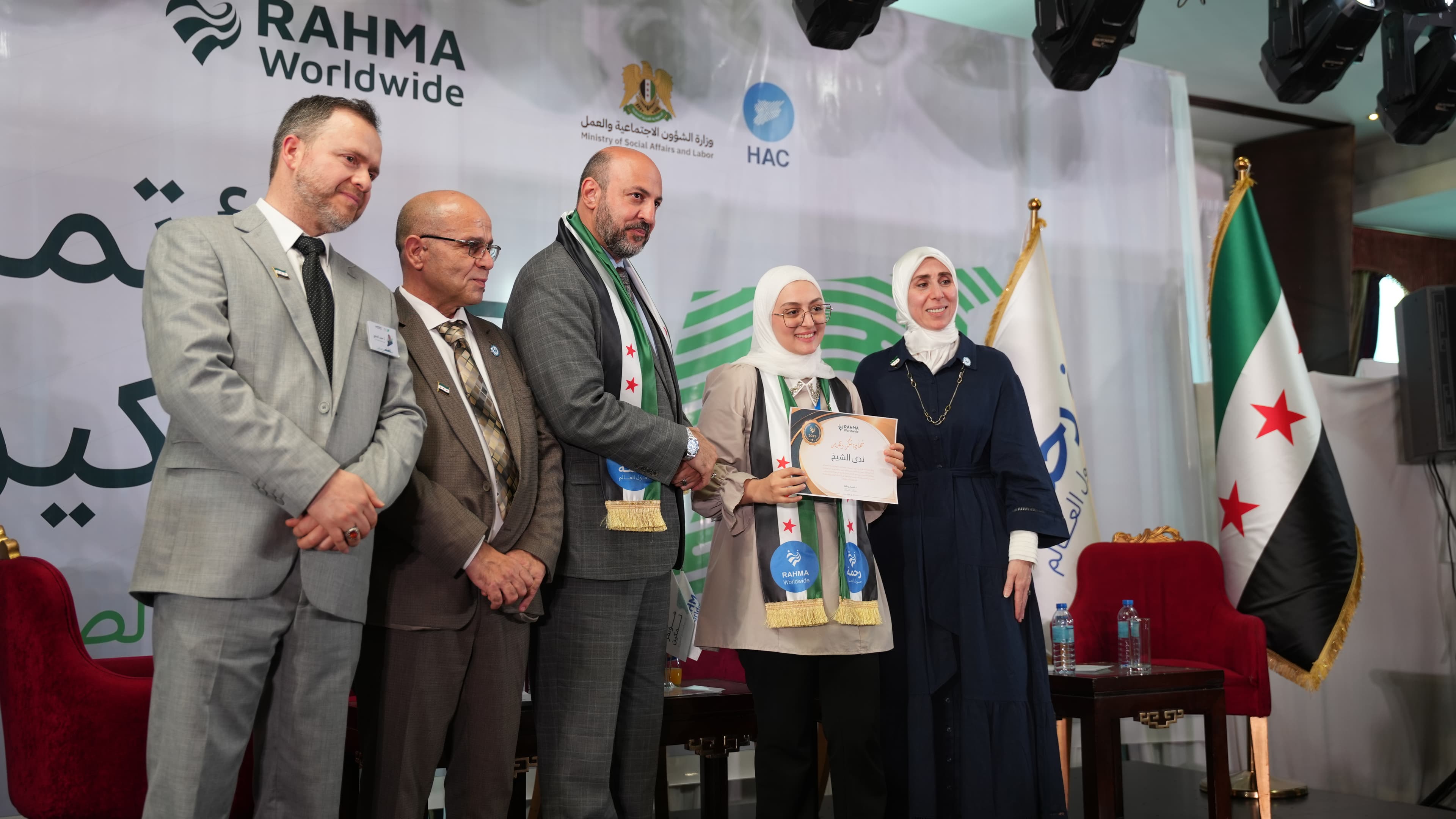 Nada with the Rahma Worldwide team at an award ceremony